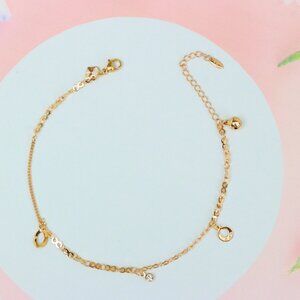 "Rose Gold Anklet with Hollow Charms and Bell, Elegant Chain Design, XPAL1062